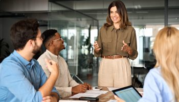 Happy,Middle,Aged,Business,Woman,Executive,Ceo,Leader,Discussing,Project