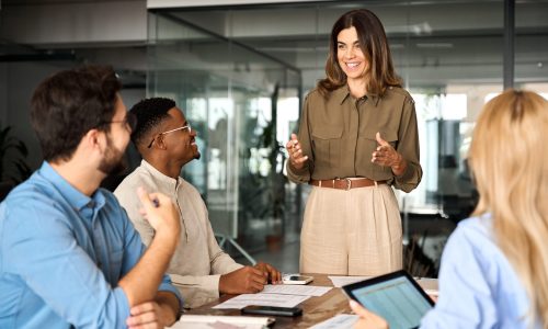 Happy,Middle,Aged,Business,Woman,Executive,Ceo,Leader,Discussing,Project
