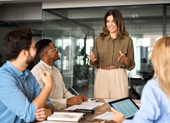 Happy,Middle,Aged,Business,Woman,Executive,Ceo,Leader,Discussing,Project