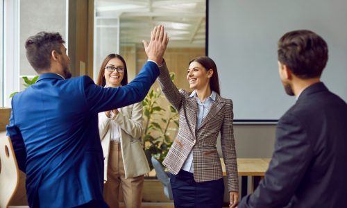 Business,People,High,Five,Happy,Team,Celebration,Or,Office,Greeting. Business,People,High,Five,Happy,Team,Celebration,Or,Office,Greeting.
